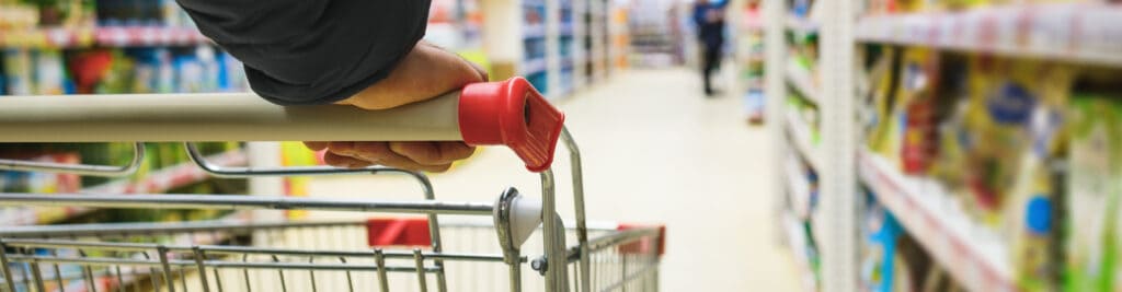 A person walking through a supermarket